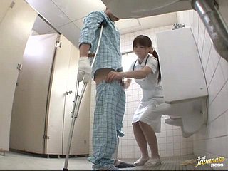 Sultry Japanese nurse b like gives a handjob in slay rub elbows with at all events