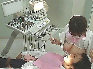 Vicious Japanese Dentist Jerks Off Her Clients While They Suck Her Big Jugs